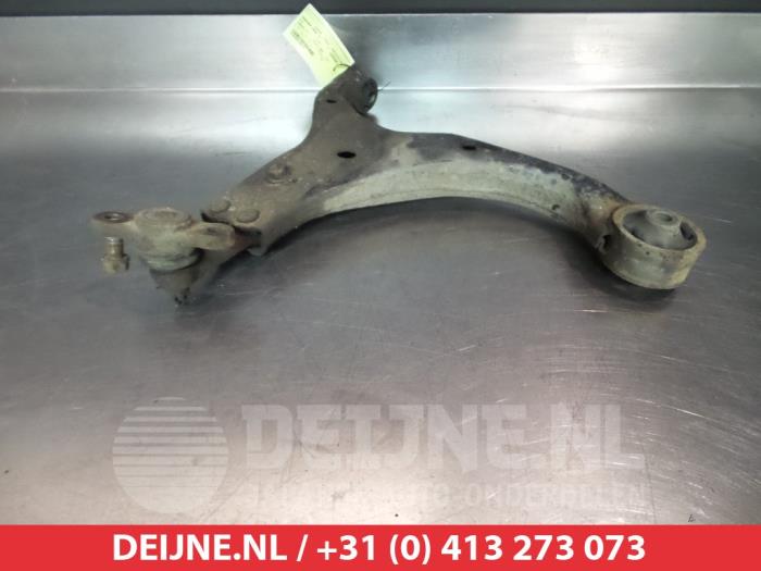 Kia Carens Draagarm onder rechts-voor O382368
