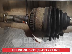 Nissan Almera Tino Aandrijfas links-voor O317817 foto 2