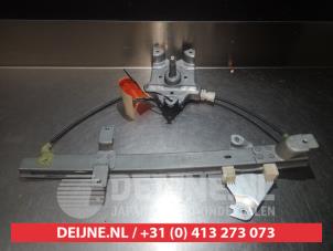 Nissan Almera Tino Rear door window mechanism 4-door, left O290432 photo 2