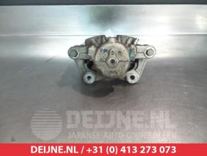 Nissan Micra Front brake calliper, right O326211 photo 2