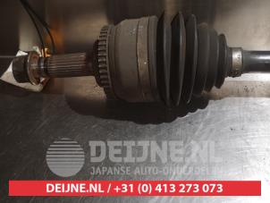 Nissan Almera Tino Aandrijfas rechts-voor O319273 foto 2