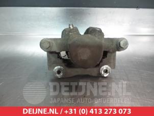 Toyota Corolla Verso Rear brake calliper, left O376580 photo 2
