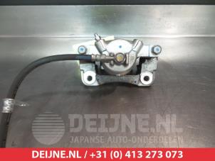 Suzuki Celerio Bremszange links vorne O325484 foto 2