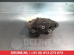 Daewoo Nubira Rear brake calliper, right O377103 photo 2