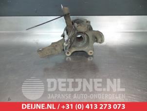 Nissan Almera Fusee rechts-voor O323511 foto 2