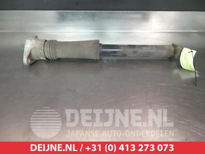 Kia Carens Schokdemper links-achter O378537