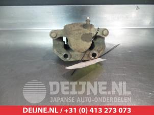 Ssang Yong Musso Bremszange links hinten O376356 foto 2