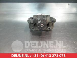 Kia Carens Bremszange links hinten O376301 foto 2
