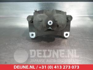 Mitsubishi Grandis Bremszange links vorne O325265 foto 2