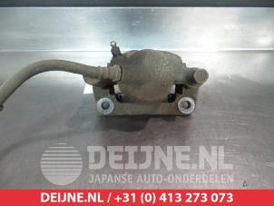 Suzuki Wagon R+ Bremszange links vorne O325490 foto 2
