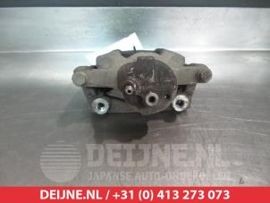 Toyota Aygo Front brake calliper, left O325768 photo 2