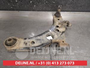 Subaru Justy Front lower wishbone, left O381272 photo 2