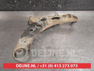 Subaru Justy Front lower wishbone, left O381272 photo 3