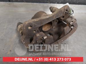 Toyota Starlet Bremszange rechts vorne O326852 foto 2