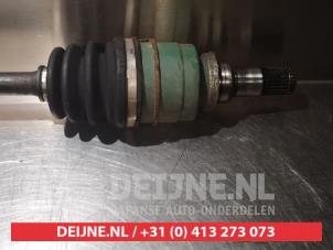 Toyota Yaris Aandrijfas links-voor O318571 foto 3