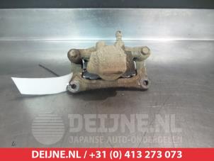 Mitsubishi Grandis Rear brake calliper, left O376448 photo 2
