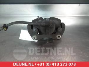 Toyota Avensis Front brake calliper, left O325647 photo 2