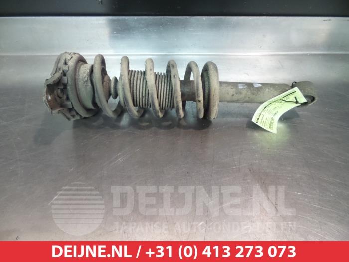 Nissan Primera Rear shock absorber rod, left O377681