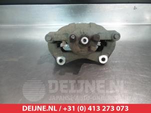 Mitsubishi Lancer Remklauw (Tang) links-voor O325184 foto 2
