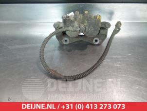 Ssang Yong Actyon Bremszange links vorne O325146 foto 2