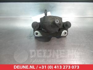 Toyota Starlet Remklauw (Tang) links-voor O325558 foto 2