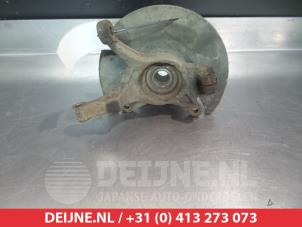 Suzuki Liana Achsschenkel rechts vorne O324034 foto 2