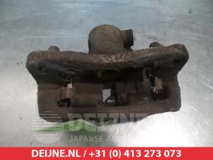 Mitsubishi Pajero Rear brake calliper, left O376428 photo 2
