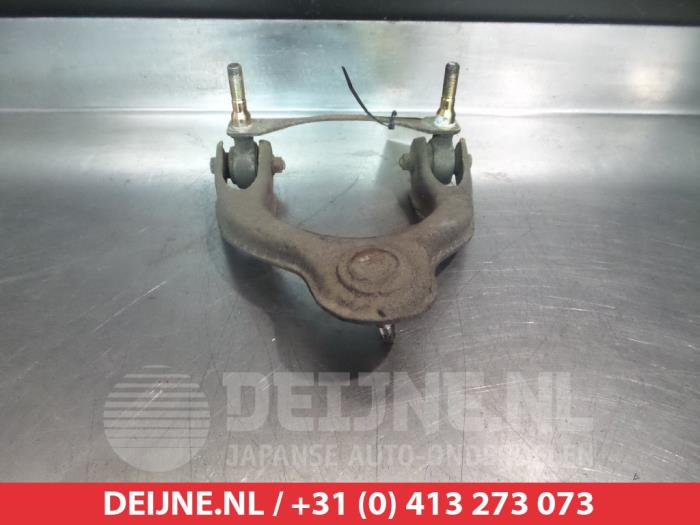 Honda Civic Draagarm boven rechts-voor O380880