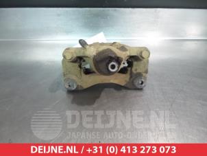 Subaru Legacy Rear brake calliper, right O376990 photo 2