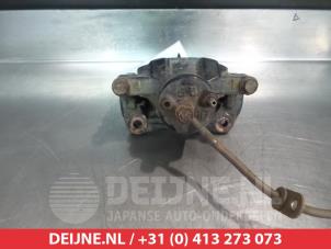 Toyota MR II Bremszange links vorne O325702 foto 2