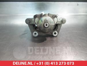 Nissan Note Front brake calliper, right O326074 photo 2