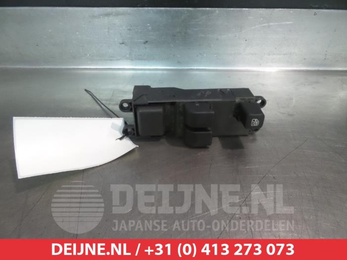 Nissan Micra Combischakelaar ramen O311590