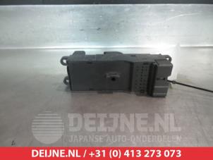 Nissan Micra Multi-functional window switch O311590 photo 2