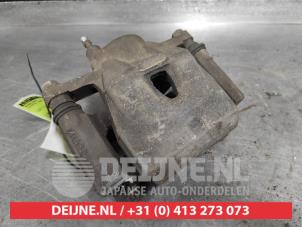 Toyota Yaris Bremszange rechts vorne O326923 foto 2