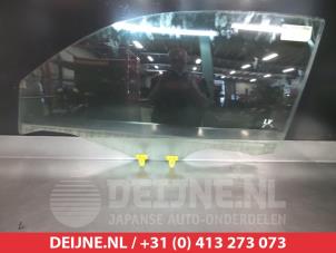 Gebruikte Deurruit 2Deurs links Nissan Micra (K12) 1.2 16V Prijs € 35,00 Margeregeling aangeboden door V.Deijne Jap.Auto-onderdelen BV