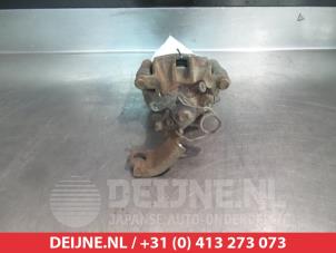 Honda Accord Bremszange links hinten O376489 foto 2
