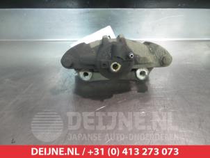 Toyota Yaris Bremszange rechts vorne O26359 foto 2