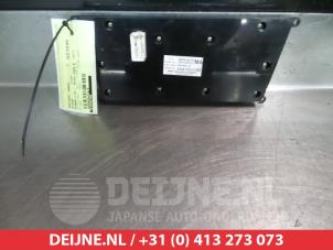 Nissan Almera Tino Radio control panel O312580 photo 2