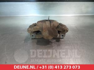 Mitsubishi Pajero Bremszange links hinten O376429 foto 2