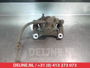 Mitsubishi Space Star Bremszange links vorne O325168 foto 2