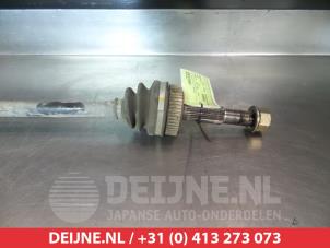 Nissan Qashqai Aandrijfas links-achter O374807 foto 2