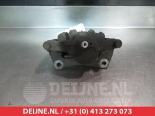 Toyota Corolla Bremszange links vorne O325605 foto 2