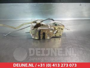 Mazda Demio Front door lock mechanism 4-door, right O280665 photo 2