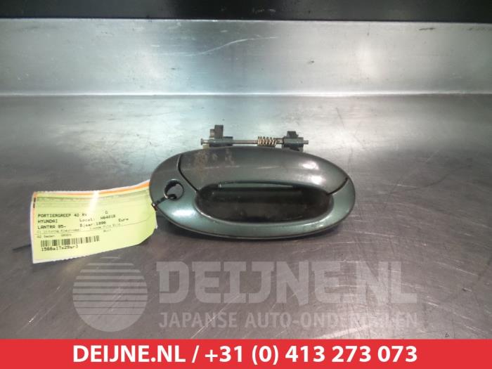 Hyundai Lantra Front door handle 4-door, right O277494