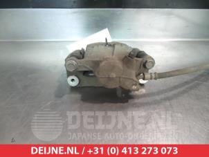 Subaru Impreza Bremszange links hinten O376231 foto 2