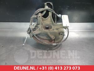 Subaru Impreza Achsschenkel links hinten O380403 foto 2