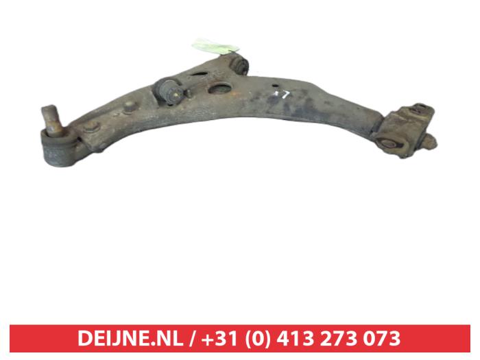 Mazda 323 Front lower wishbone, left O380991