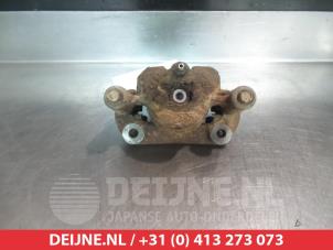 Suzuki Jimny Bremszange links vorne O325507 foto 2