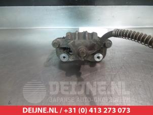 Ssang Yong Korando Bremszange rechts hinten O377107 foto 2