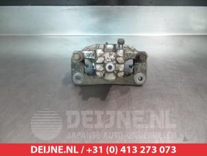 Mitsubishi Pajero Bremszange links hinten O376440 foto 2